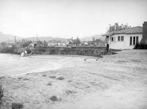 L.A. River flooding, collapsed house in North Hollywood