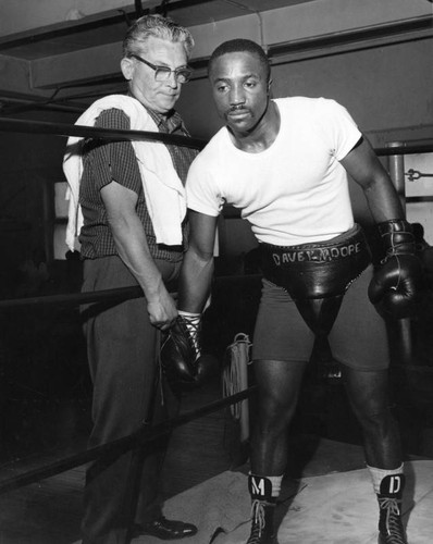 Davey Moore and his trainer