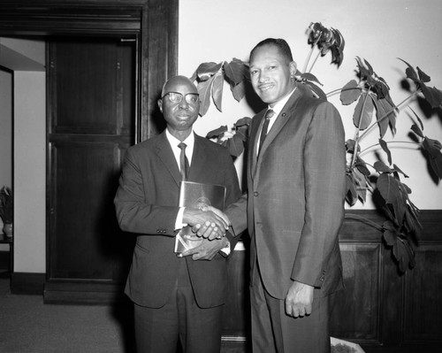 Councilman Tom Bradley with Momolu Dukuly at City Hall