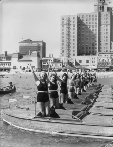 Bathing beauties in paddle boats at Exposition