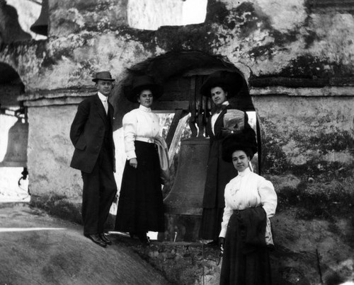 Posing at bell tower, Mission San Gabriel Arcangel