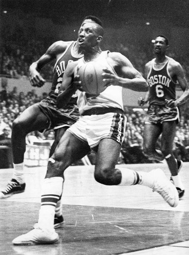 Lakers' Dick Barnett drives on Boston basket