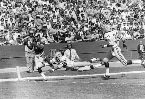 Rams playing the Packers at the Coliseum