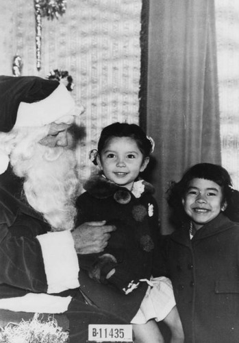 Girls with department store Santa