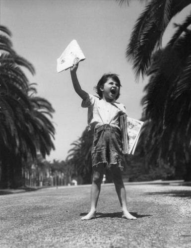 Girl selling newspapers, view 3