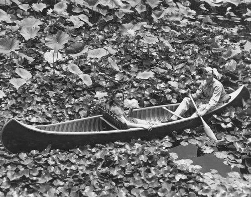 Soldier and girlfriend in canoe