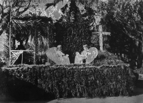 Two young girls on a parade float