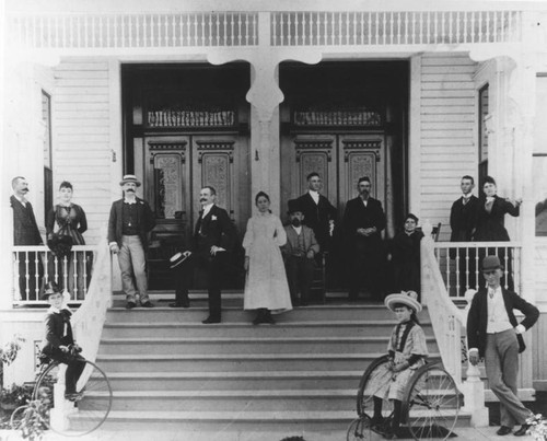 Family in front of home