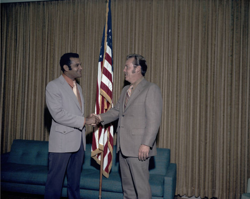 Billy Mills with unidentified man at Los Angeles City Hall