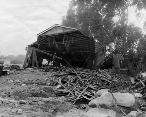 Swirling waters carry house a block away