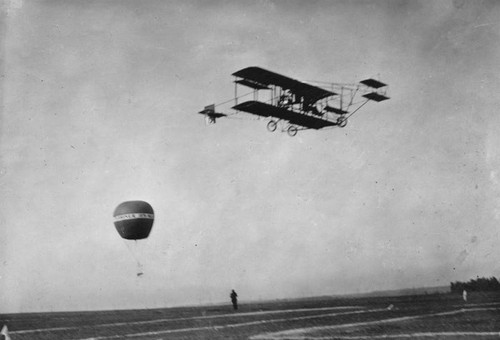 Biplane and balloon