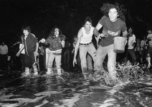 Happy grunion hunters storm Cabrillo Beach