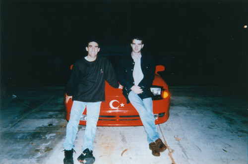 Two young Turkish men and their car