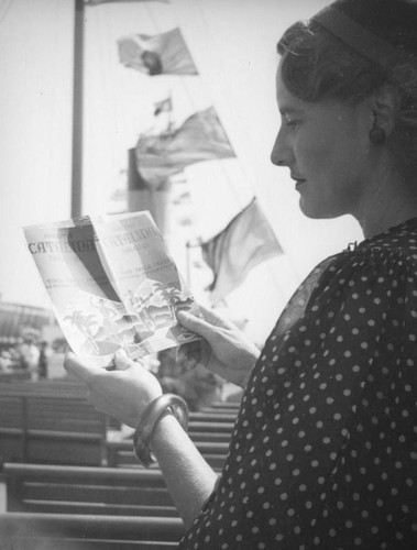 Ethel Schultheis with timetable on board the S.S. Catalina