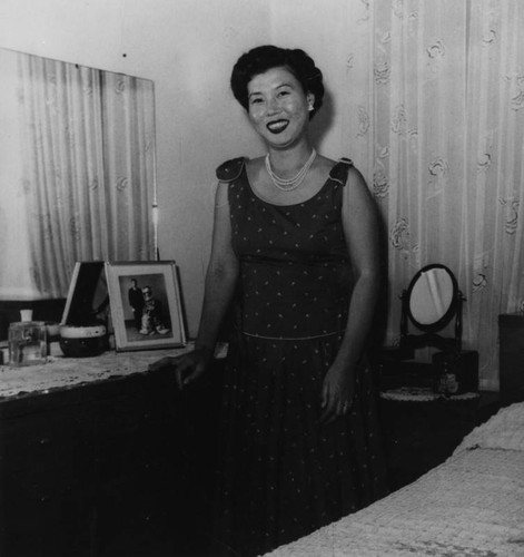 Sakae Fujimoto at home in bedroom