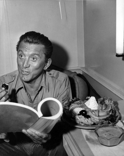 Kirk Douglas enjoys MGM salad