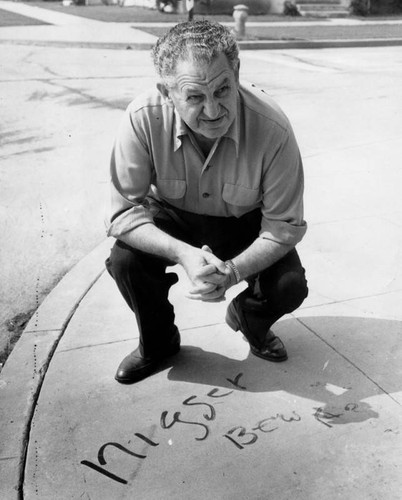 Racist writing on sidewalk