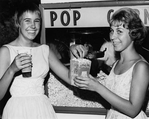 Hollywood Bowl's "Valley Night" women eating popcorn