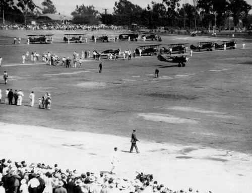 Crowds gather on Cloverfield Airport