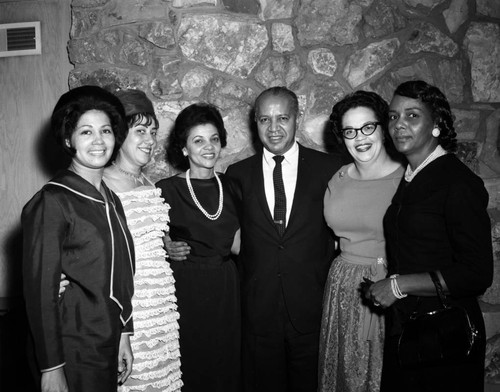 William T. Patrick and Gloria Curtis at a party