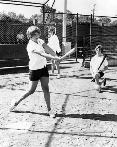 13-year-old Cindy Mills of Bobcats takes batting practice