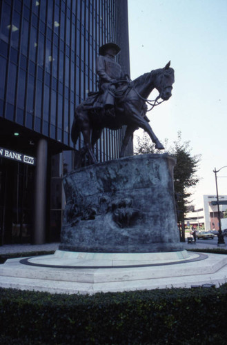 Statue outside Great Western Savings branch