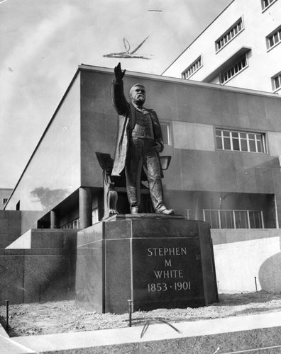 White statue outside new courthouse