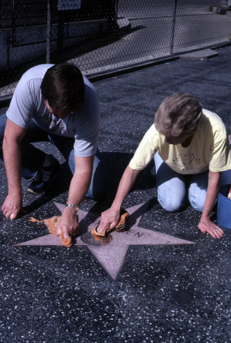 Cleaning a Walk of Fame star