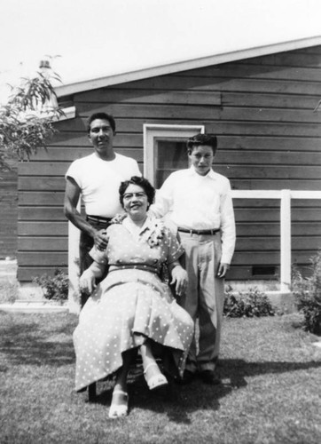 Mexican American family in backyard