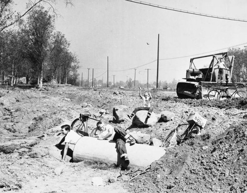 Boys play on future freeway route