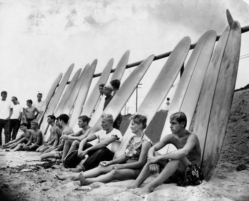 Dejected surfers at Malibu beach