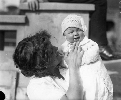 Mother holding baby