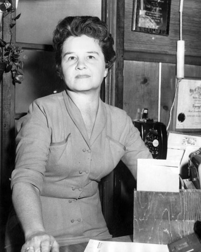 Mrs. Evelyn Olson, cashier