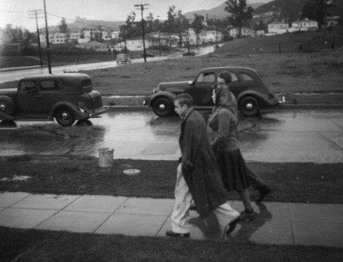 Group walking in the rain in Los Feliz