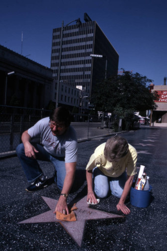 Cleaning a Walk of Fame star