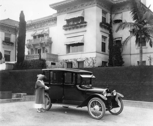 Mrs. Merritt with automobile