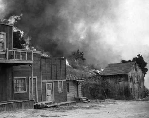 Flames threaten $200,000 ranch