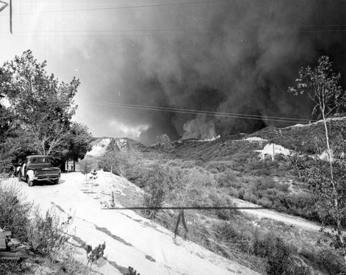 A heavy blanket of black smoke goes skyward; seen county wide