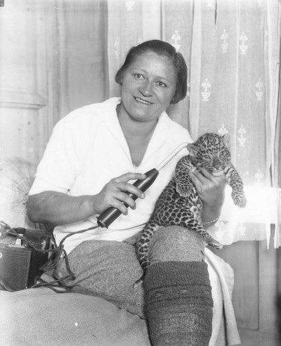 Woman and ocelot