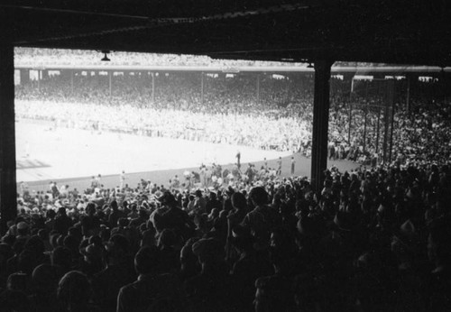 Stands at Wrigley Field, motion picture baseball game, comedians vs. leading men