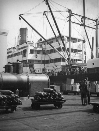 Cargo in front of the Dollar Steamship Lines at L. A. Harbor