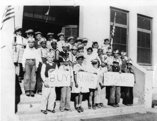 School children selling war stamps