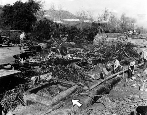 Two cars buried by flooding