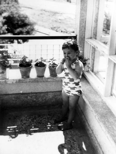 Little girl on a balcony