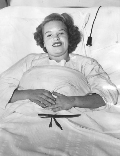 Mary Lou Fitts in hospital bed