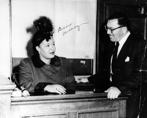 Billie Holiday and Walter Gordon in courtroom