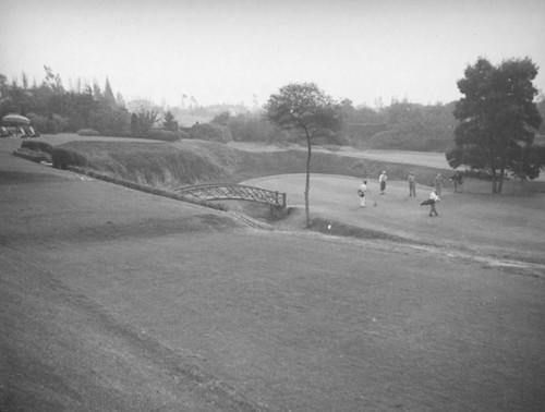 Playing golf at the Wilshire Country Club