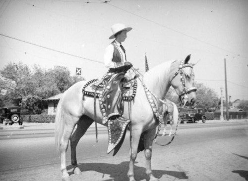 Lady on a palomino horse