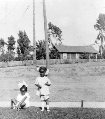 Girls in front yard