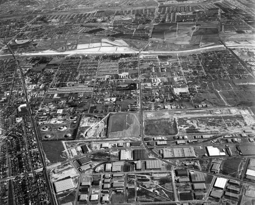 Aerial view of Vail Field and Central Manufacturing District, looking east